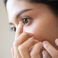 Contact Lens Fitting - woman wearing contact lens